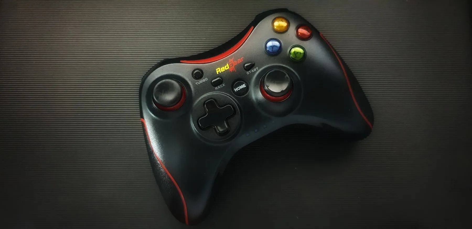 A close-up of a black game controller